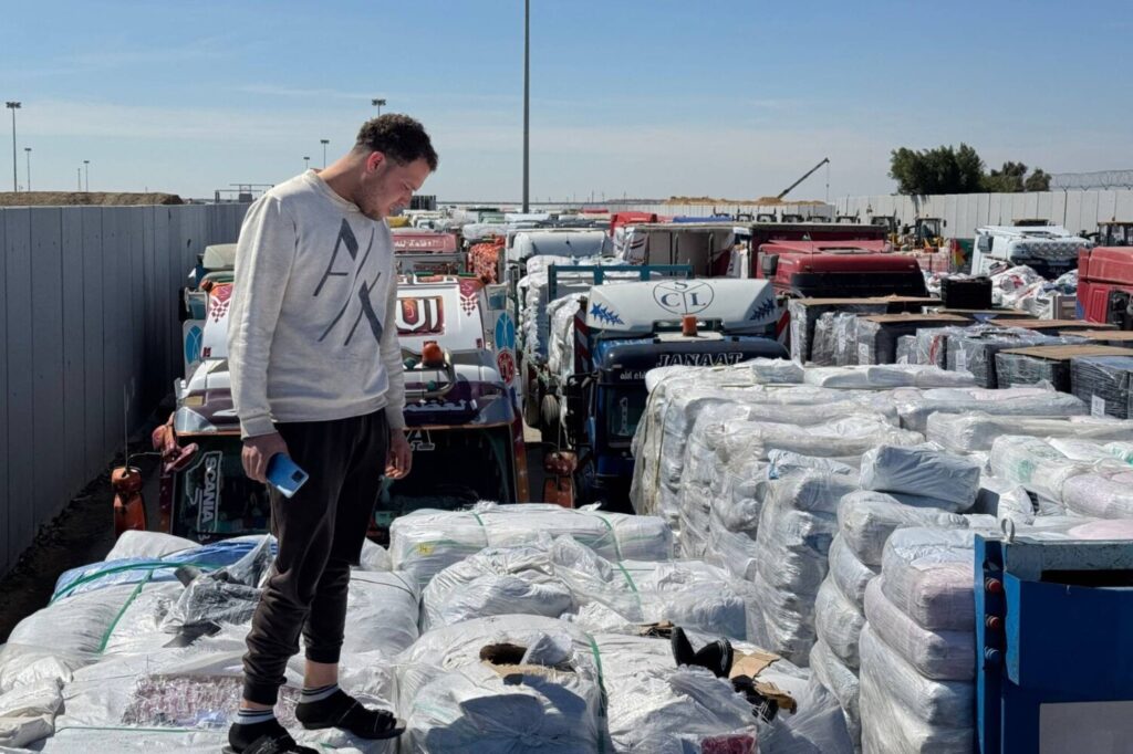 a man standing in a warehouse